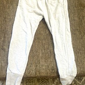 Gray sweats with blue and pink wave. Closing on bottom ankles and waist for girl